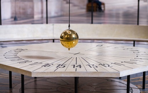 Foucault’s Pendulum swinging in Paris Pantheon.