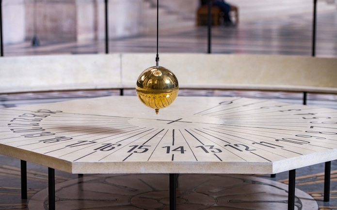 Foucault’s Pendulum swinging in Paris Pantheon.