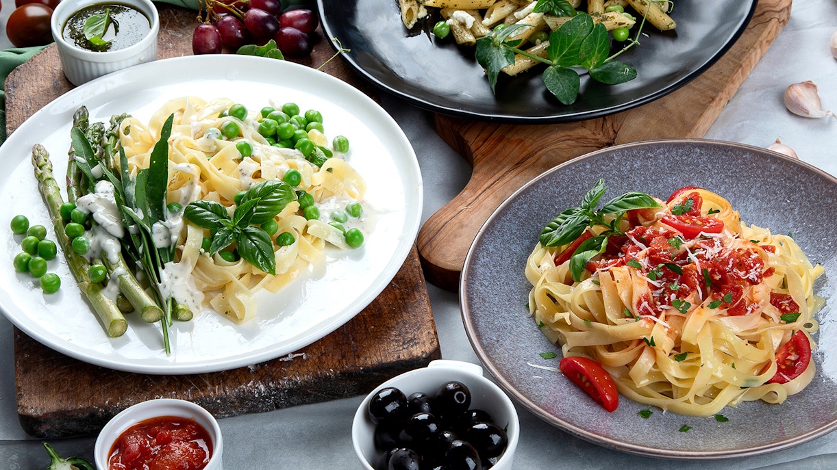 pasta dish with cherry tomatoes and basil