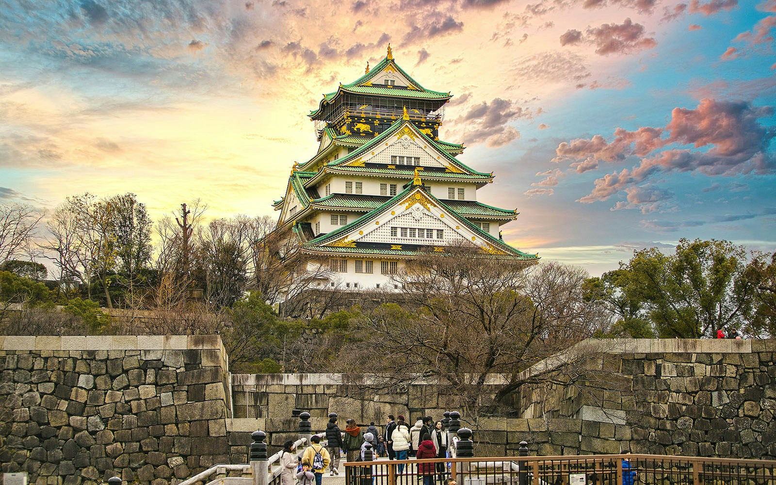 Night view of Osaka Castle and moat reflections