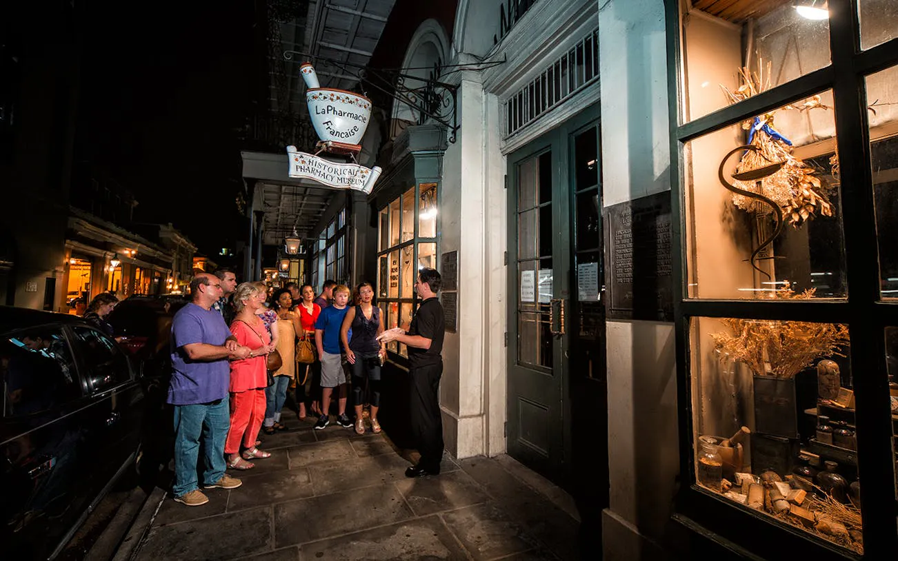 Group on New Orleans Interactive Ghosts and Spirits Walking Tour outside Pharmacy Museum.