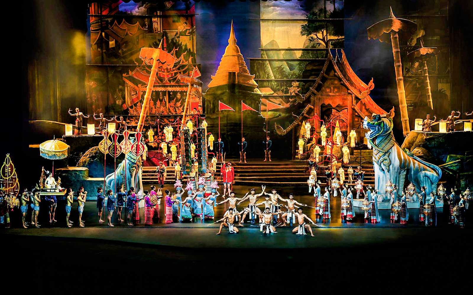 Siam Niramit Phuket show with performers in traditional costumes on stage.
