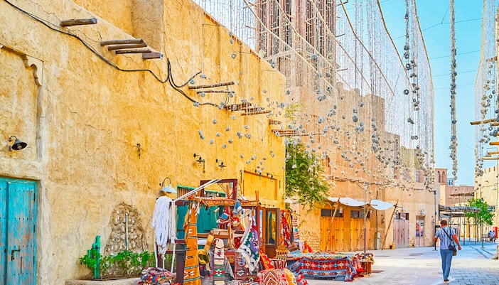 Al Fahidi Historical Neighborhood in Dubai with traditional wind-tower architecture.