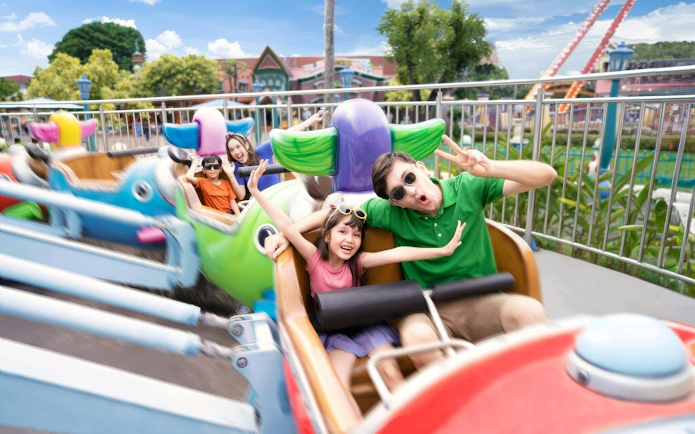 Families enjoying the Kolibri ride at Dunia Fantasi, Ancol, Jakarta.
