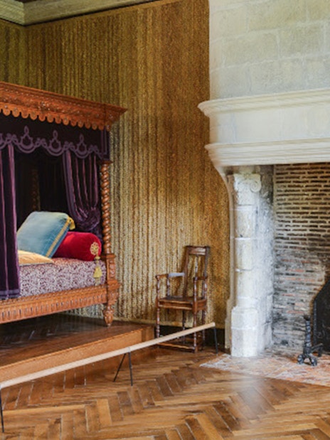 Canopy bed and fireplace in the Renaissance Room, Azay-le-Rideau, France.