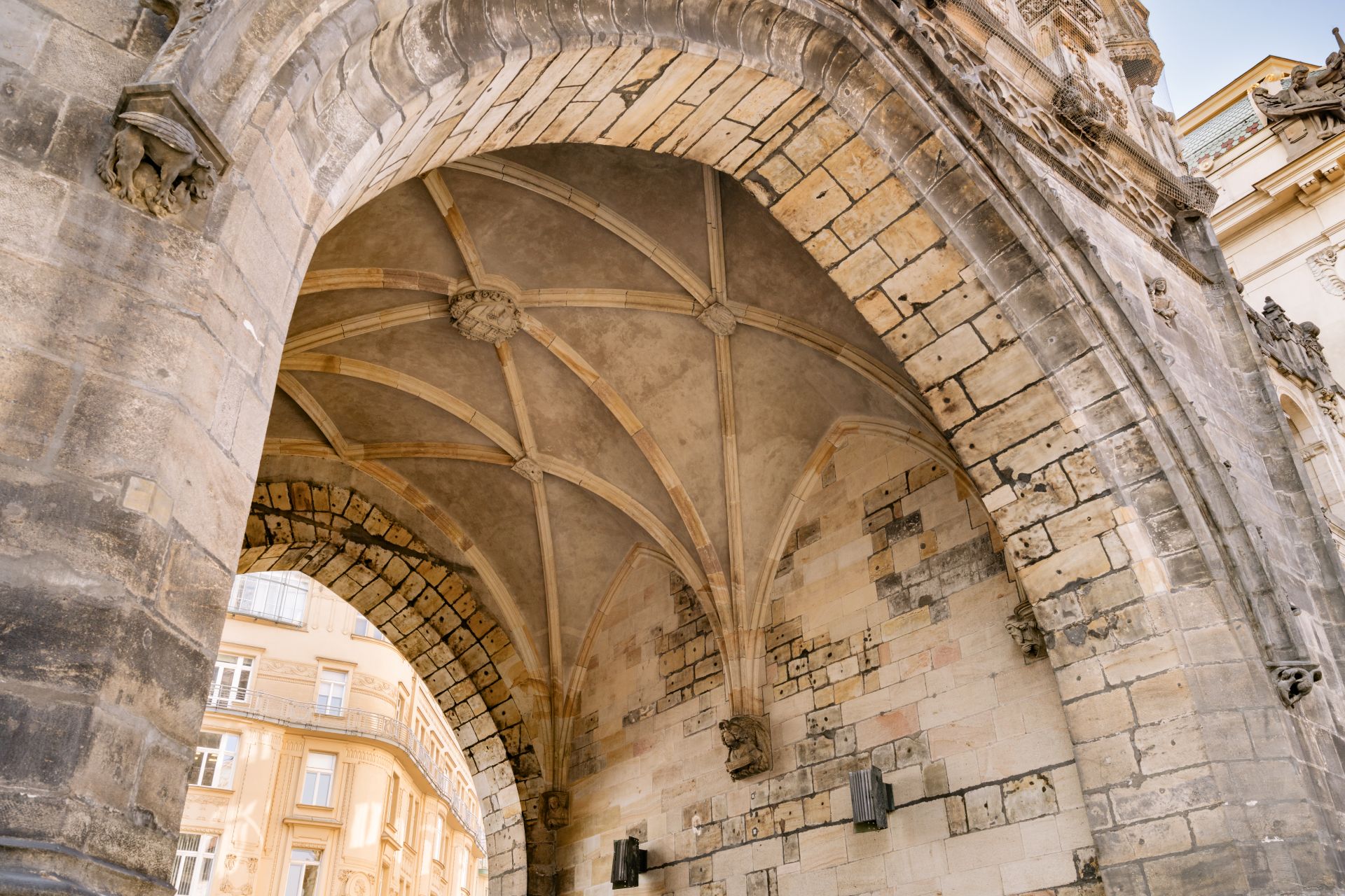 Powder Tower's Gothic archway and vaulted ceiling in Prague.