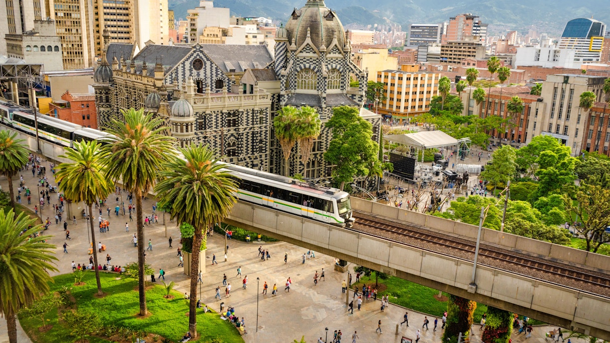 Train passing by the Palace of Culture in Medellín, Colombia.