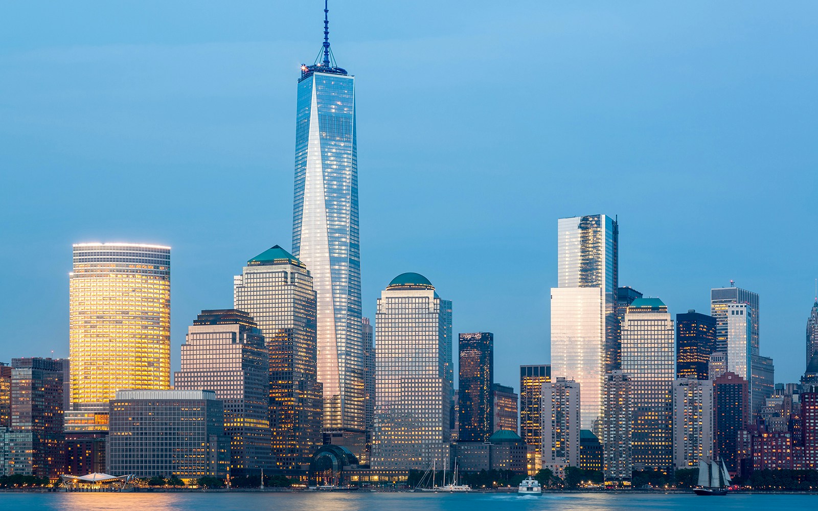 New York City skyline with One World Trade Center at dusk.