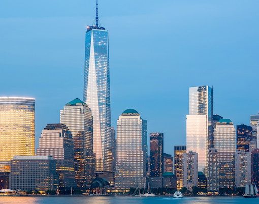 New York City skyline with One World Trade Center at dusk.