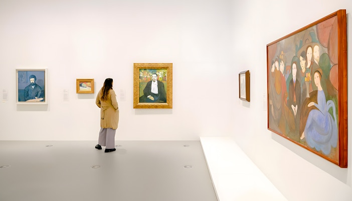 Visitor viewing Picasso paintings at The Picasso Century exhibition, National Gallery of Victoria.