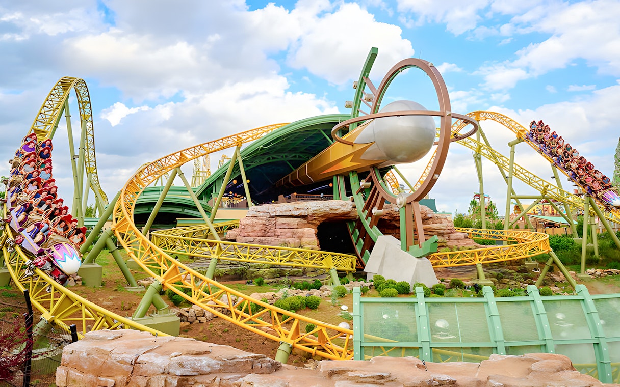Rollercoaster at Epic Universe park, Universal Orlando, with loops and riders.