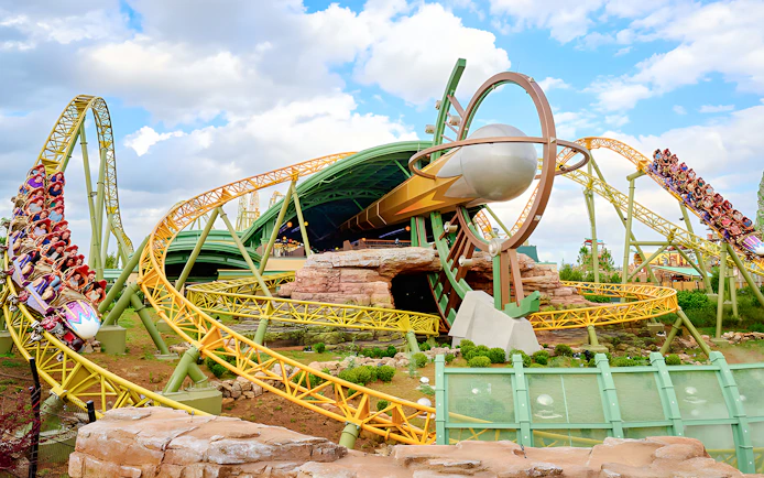 Rollercoaster at Epic Universe park, Universal Orlando, with loops and riders.