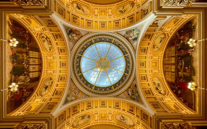 Prague National Museum interior cupola with ornate frescoes and glass dome, Czech Republic.