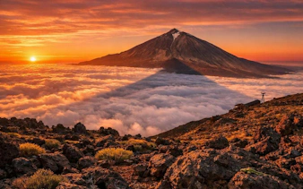 Sunset view of Teide National Park with clouds and mountain peak, Tenerife.