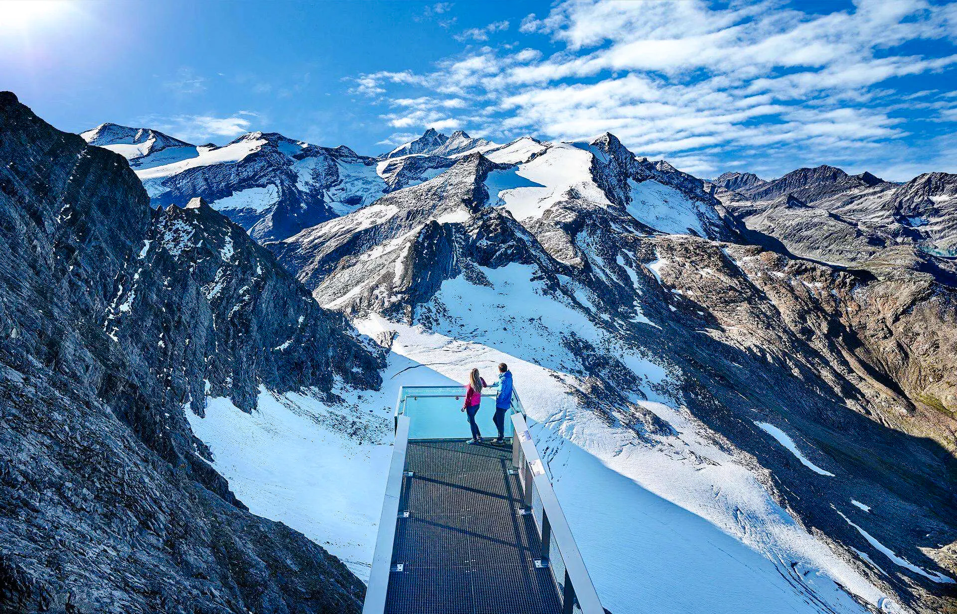 Viewing platform overlooking snowy peaks at Kitzsteinhorn, Zell am See, Salzburg.