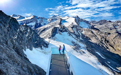 Viewing platform overlooking snowy peaks at Kitzsteinhorn, Zell am See, Salzburg.