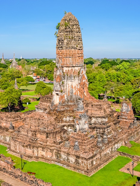 Aerial view of ancient temple ruins in Ayutthaya Historical Park, Thailand.