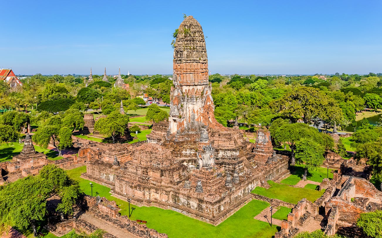 Aerial view of ancient temple ruins in Ayutthaya Historical Park, Thailand.