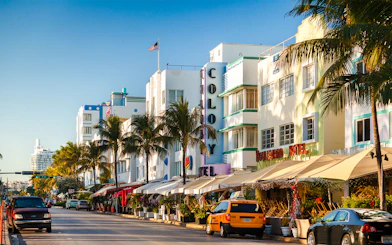 Ocean Drive in South Beach, Miami Beach with art deco buildings and palm trees.