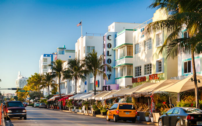 Ocean Drive in South Beach, Miami Beach with art deco buildings and palm trees.