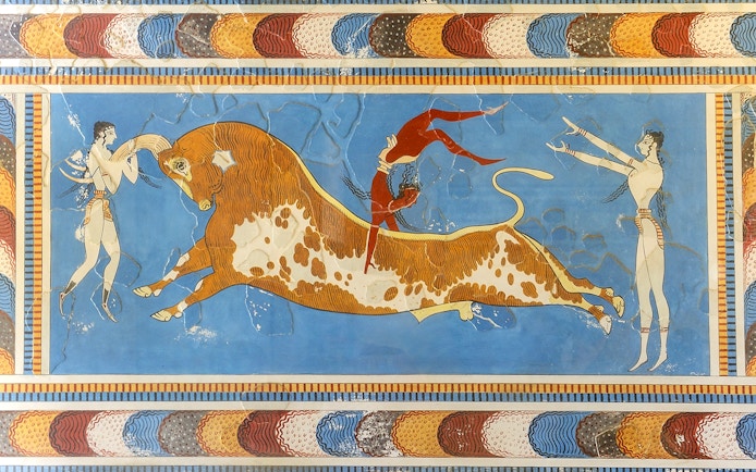Bull-leaping fresco with two women and a man at Knossos Palace, Crete.