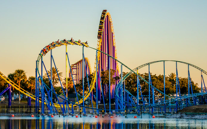 Steel Eel Hypercoaster at SeaWorld San Antonio with riders on a steep drop.