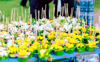 Floral arrangements with incense sticks at Lanna Sky Lantern Festival, Nong Sariam, Chiang Mai.
