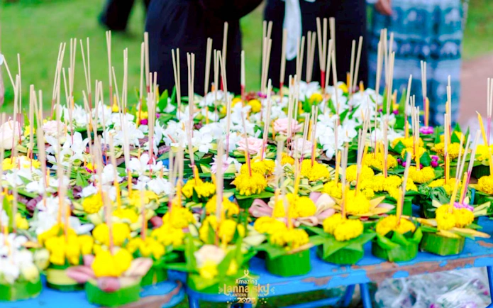 Floral arrangements with incense sticks at Lanna Sky Lantern Festival, Nong Sariam, Chiang Mai.