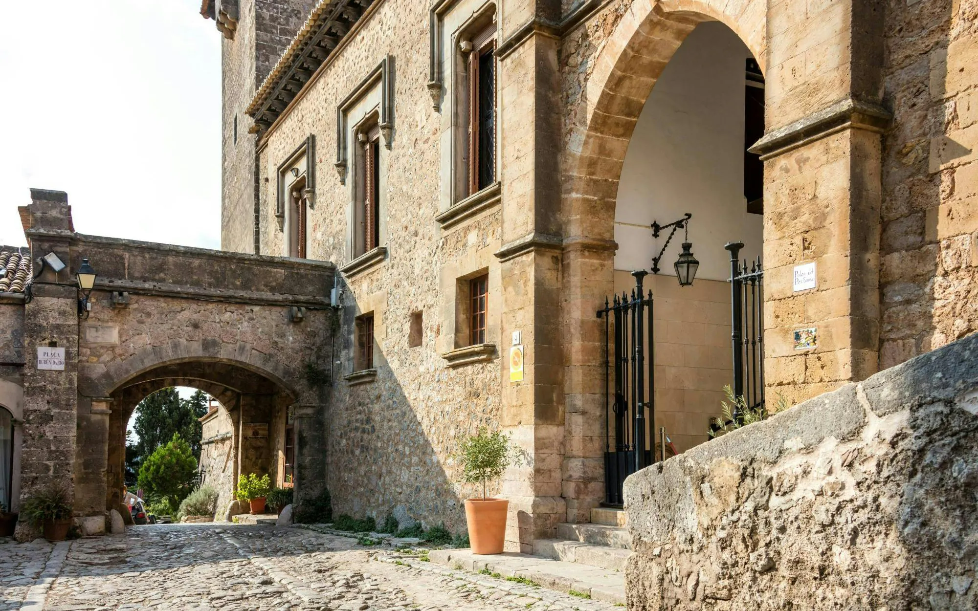 Stone architecture of the Valldemossa Charterhouse entrance in Mallorca, Spain.