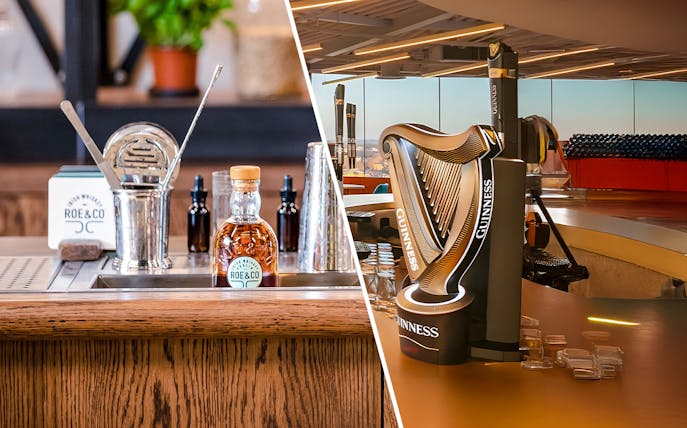 Roe & Co whiskey bottle and bar tools beside Guinness harp tap at distillery and storehouse.