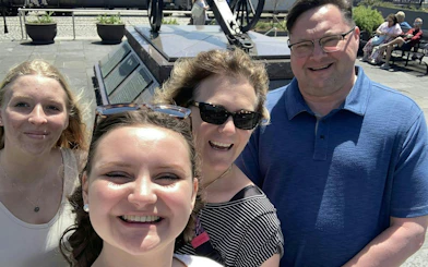 Group enjoying a sunny day in New Orleans French Quarter during a self-guided city exploration game.