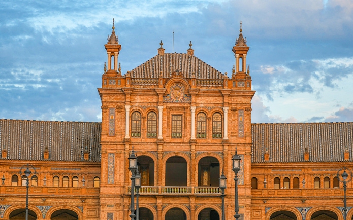 Spain Square's ornate building facade in Seville during a guided tour.