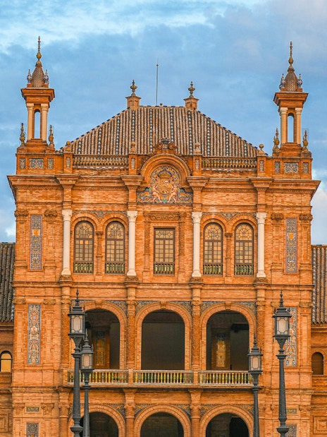 Spain Square's ornate building facade in Seville during a guided tour.