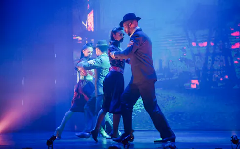 Dancers performing at Madero Tango Show in Buenos Aires.