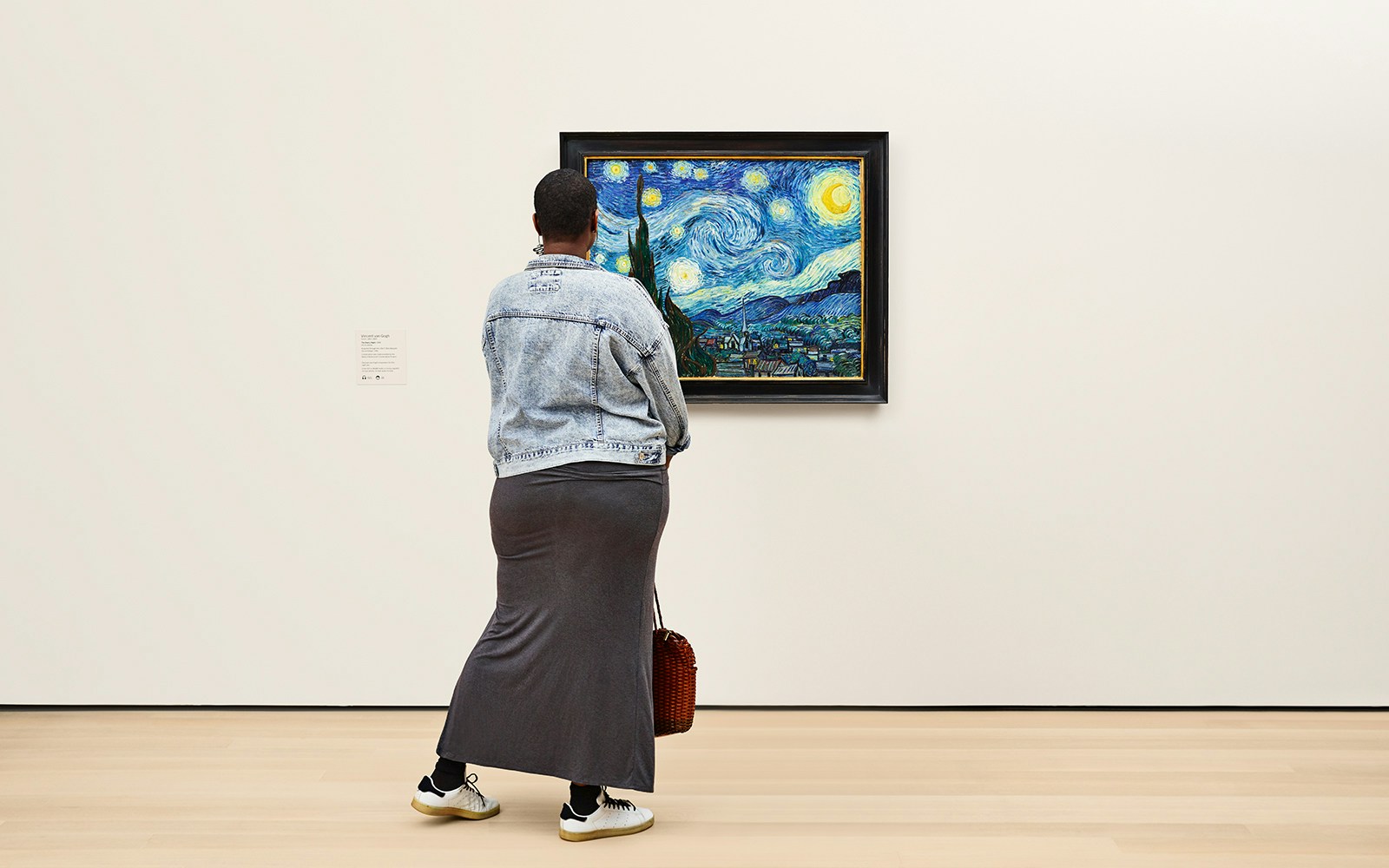Woman viewing The Starry Night on 2nd floor of MoMa