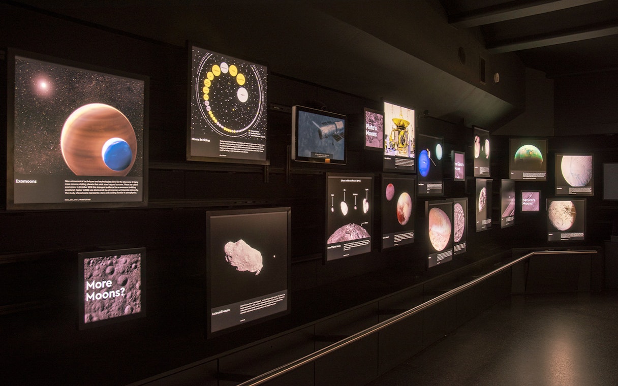 Exhibit of celestial bodies and space exploration at Royal Observatory Planetarium Gallery.