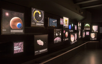 Exhibit of celestial bodies and space exploration at Royal Observatory Planetarium Gallery.