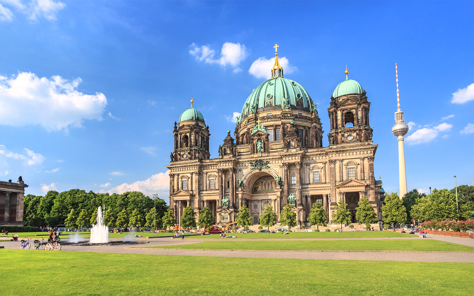 Facade of Berlin Cathedral with fountain in foreground, Berlin.