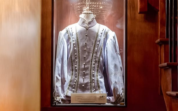Opera costume display at Bel Canto, Paris dinner show.