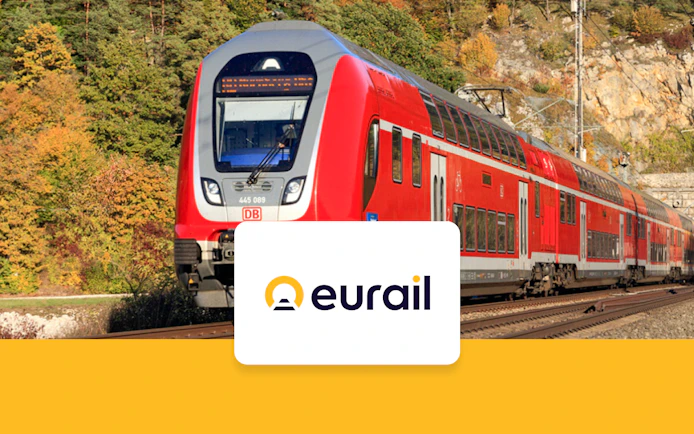 Red train on tracks in Germany with Eurail logo, promoting German Continuous Pass for 2nd class seats.