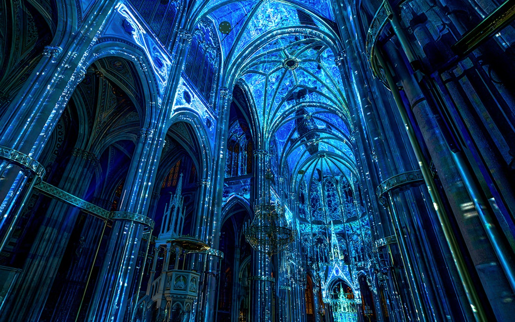Votivkirche interior illuminated in blue light, Vienna.