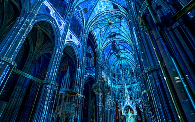 Votivkirche interior illuminated in blue light, Vienna.