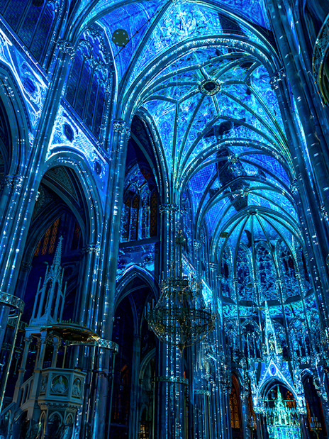 Votivkirche interior illuminated in blue light, Vienna.