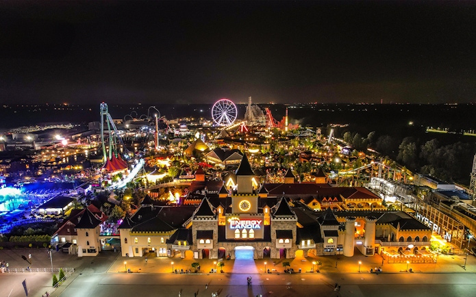 Aerial view of Energylandia Theme Park illuminated at night in Zator, near Krakow, Poland.
