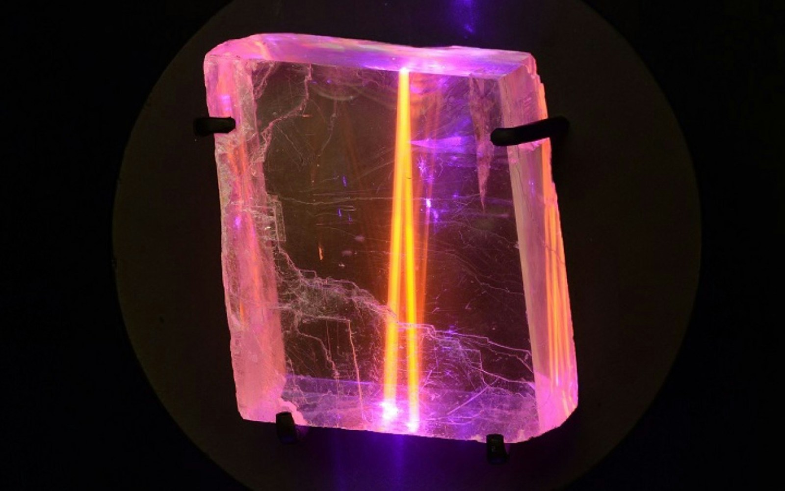 Glowing gemstone exhibit at Natural History Museum Vienna.