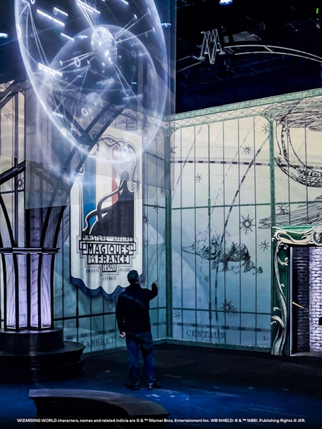 Interactive Harry Potter exhibit with magical projections and themed decor.
