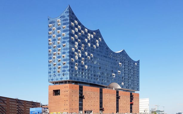 Elbphilharmonie Hamburg with its distinctive glass facade and wave-like roof.