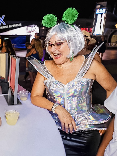 Guests enjoying drinks at Kennedy Space Center's exclusive after-hours event.