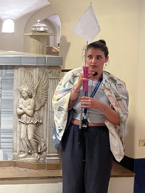 Tomb of Pope John Paul I in Vatican Grottoes, Vatican City, with a guide explaining.