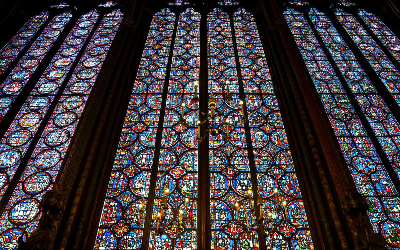 Stained glass windows of Sainte-Chapelle, Paris, viewed from a lower angle.